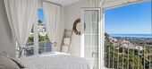 Elegante Casa Adosada con Vistas Panorámicas al Mar