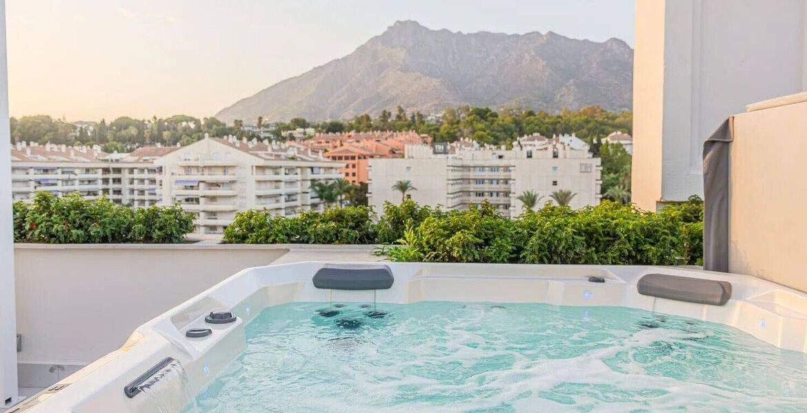 Luxury Beachside Penthouse with Rooftop Jacuzzi in Marbella